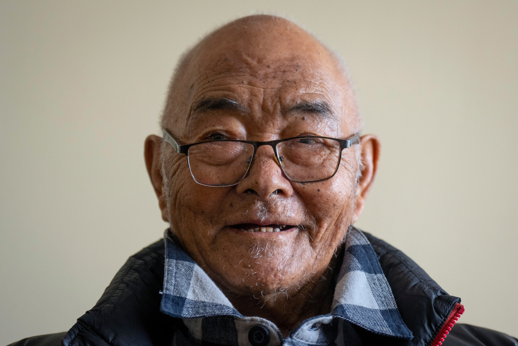 FILE - Kanchha Sherpa, 91, who was among the 35 members in the team that put New Zealander Edmund Hillary and his Sherpa guide Tenzing Norgay atop the 8,849-meter (29,032-foot) peak on May 29, 1953, speaks during an interview with The Associated press in Kathmandu, Nepal, March 2, 2024. (AP Photo/Niranjan Shrestha, File)