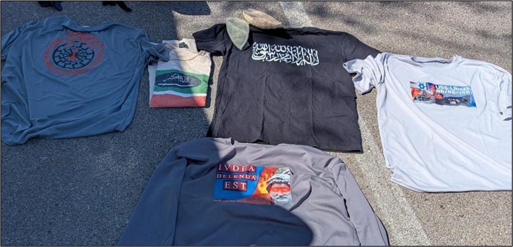 This photo provided by U.S. Attorney's Office shows clothing displaying antisemitic, anti-Israel, and extremist symbols that were found in former Navy SEAL Seal Gregory Vandenberg vehicle by authorities. (U.S. Attorney's Office via AP)