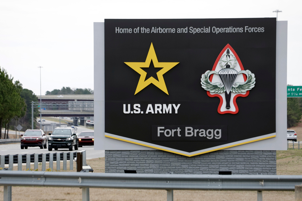 FILE - A sign for Fort Bragg is seen, March 7, 2025, in Fort Bragg, N.C. (AP Photo/Chris Seward, File)