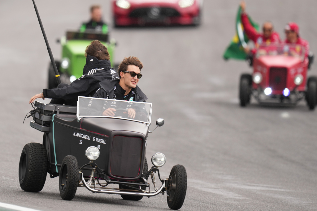 Mercedes driver George Russell of Britain drives during the opening parade at the Brazilian Formula One Grand Prix at the Interlagos race track in Sao Paulo, Sunday, Nov. 9, 2025. (AP Photo/Andre Penner)