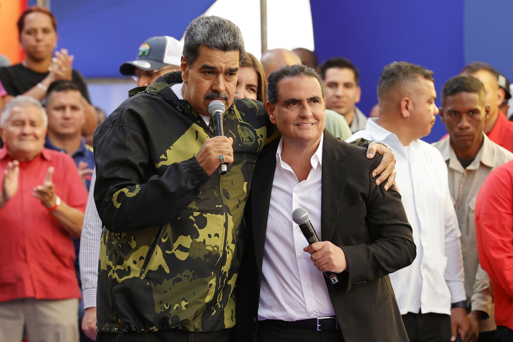 FILE - Venezuela's President Nicolas Maduro, left, and Alex Saab stand together during an event marking the anniversary of the 1958 coup that overthrew dictator Marcos Perez Jimenez, in Caracas, Venezuela, Jan. 23, 2024. (AP Photo/Jesus Vargas, File)