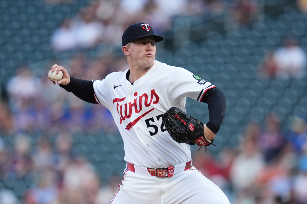Minnesota Twins starting pitcher Zebby Matthews (52) delivers during the first inning of a baseball game against the Atlanta Braves Tuesday, Aug. 18, 2026, in Minneapolis. (AP Photo/Abbie Parr)