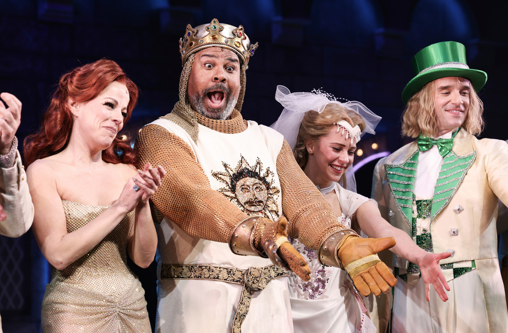FILE - Leslie Rodriguez Kritzer, left, and James Monroe Iglehart, center, appear with other cast members at the curtain call for "Spamalot" in New York on Nov. 16, 2023. (Photo by CJ Rivera/Invision/AP, File)