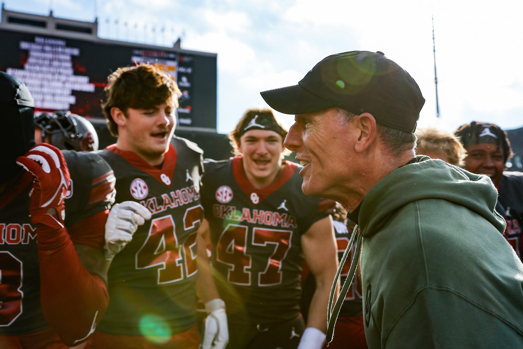 Oklahoma head coach Brent Venables celebrates with his team after they defeated Missouri in an NCAA college football game Saturday, Nov. 22, 2025, in Norman, Okla. (AP Photo/Alonzo Adams)