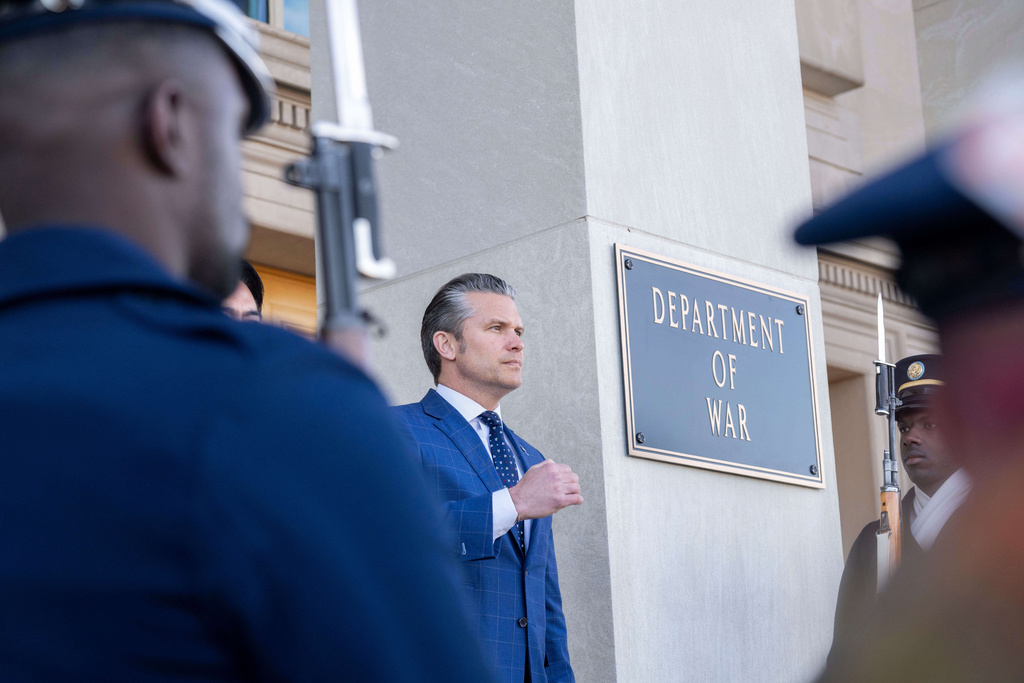 Defense Secretary Pete Hegseth welcomes Japanese Defense Minister Shinjiro Koizumi to the Pentagon, Thursday, Jan. 15, 2026 in Washington. (AP Photo/Kevin Wolf/)