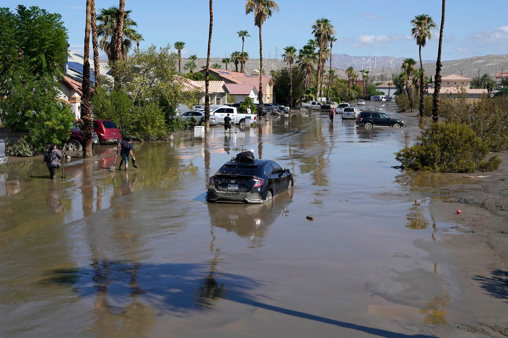 FILE - Cars are seen stuck in the mud following Tropical Storm Hilary on a street Aug. 21, 2023, in Cathedral City, Calif. (AP Photo/Mark J. Terrill, File)