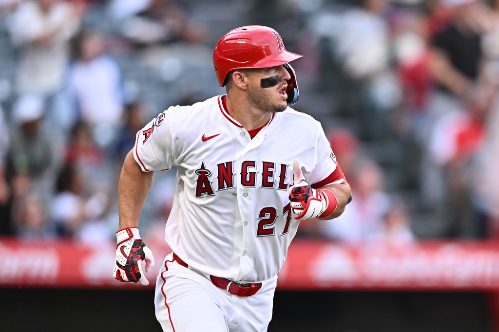 Los Angeles Angels' Mike Trout runs after hitting a home run during the first inning of a baseball game against the Texas Rangers, Monday, Aug. 10, 2026, in Anaheim, Calif. (AP Photo/William Liang)