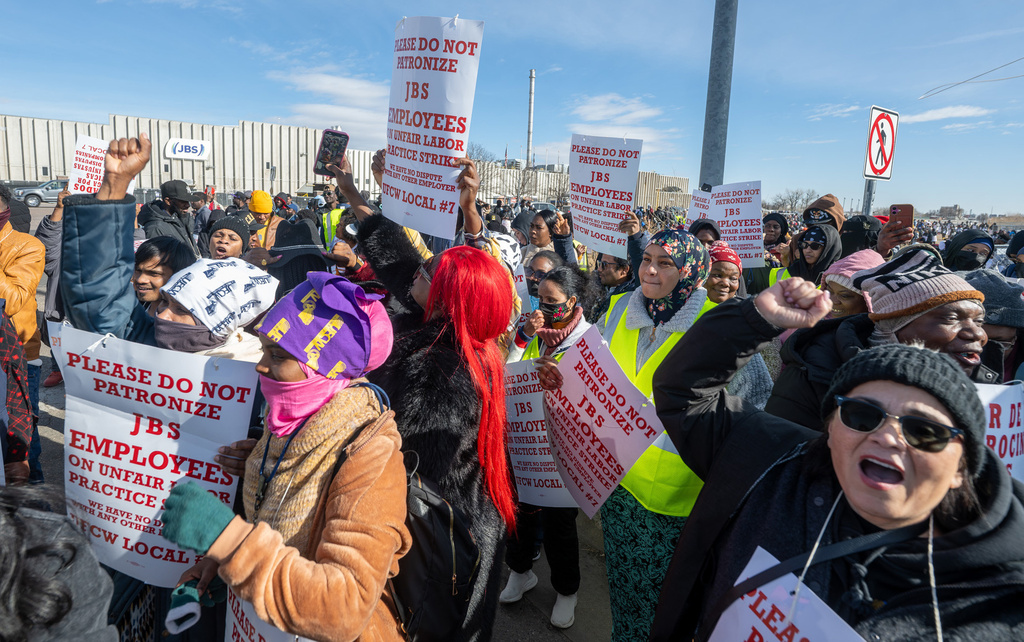Workers from the JBS Beef Plant protest across the road from the plant on March 16, 2026 in Greeley, Colo. Nearly 3800 workers with the United Food & Commercial Workers (UCFW) are on strike protesting unfair work conditions. (Jerilee Bennett/The Gazette via AP)