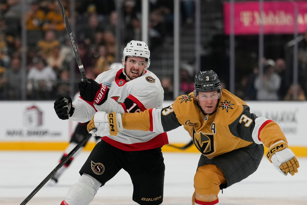 Ottawa Senators right wing Drake Batherson (19) skates against Vegas Golden Knights defenseman Brayden McNabb (3) during the first period of an NHL hockey game Wednesday, Nov. 26, 2025, in Las Vegas. (AP Photo/Lucas Peltier)