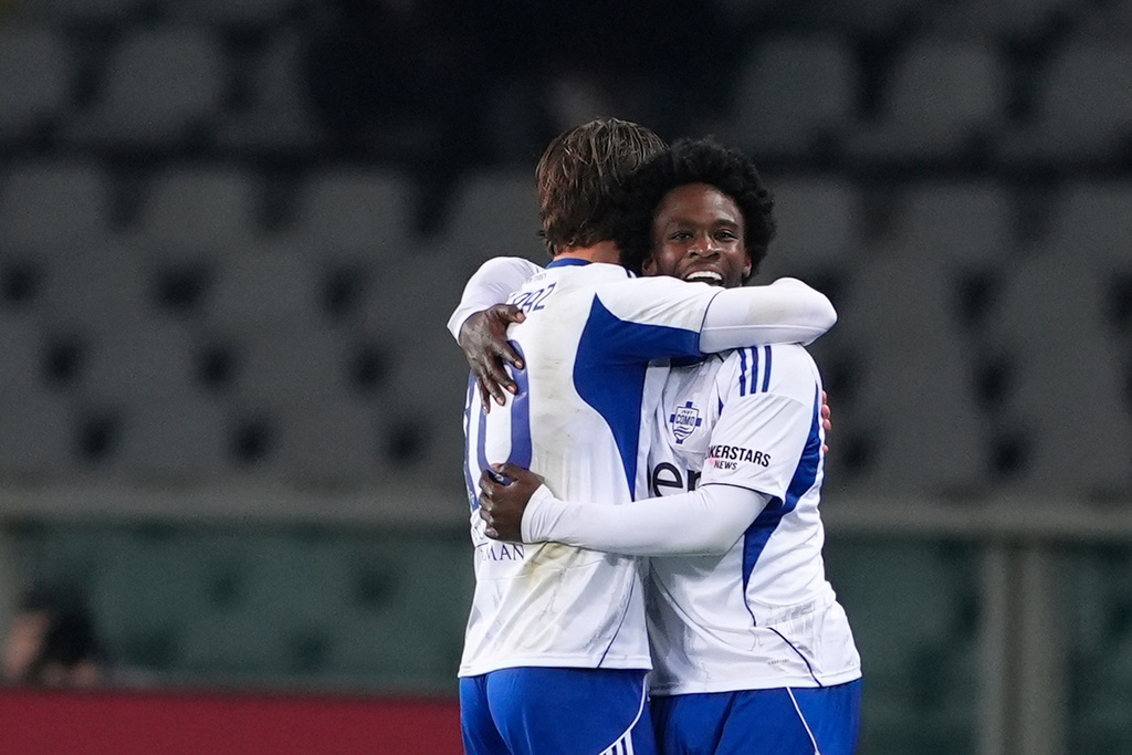Como's Jayden Addai celebrates after scoring during the Serie A soccer match between Torino and Como, in Turin, Italy, Monday, Nov. 24, 2025. (Fabio Ferrari/LaPresse via AP)