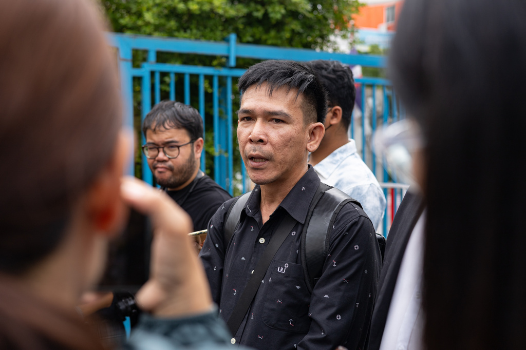 Panithi Tumkaew, a former sailor from the Thailand-flagged ship, the Mayuree Naree, stands outside the Central Labour Court in Bangkok, Thailand on Friday, July 10, 2026. (AP Photo/Anton L. Delgado)