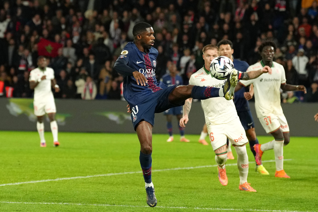 PSG's Ousmane Dembele controls the ball during the French League One soccer match between Paris Saint Germain and Nice in Paris, Saturday, Nov. 1, 2025. (AP Photo/Aurelien Morissard)
