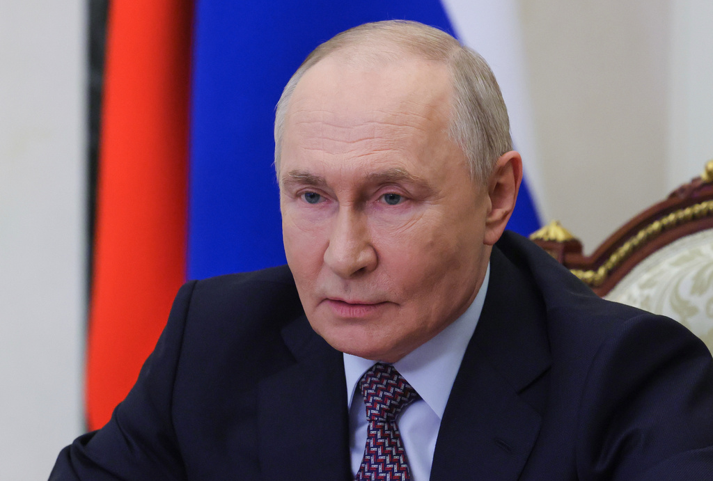 Russian President Vladimir Putin chairs a meeting with members of the Security Council via videoconference at the Kremlin in Moscow, Russia, Friday, May 8, 2026. (Mikhail Metzel, Sputnik, Kremlin Pool Photo via AP)