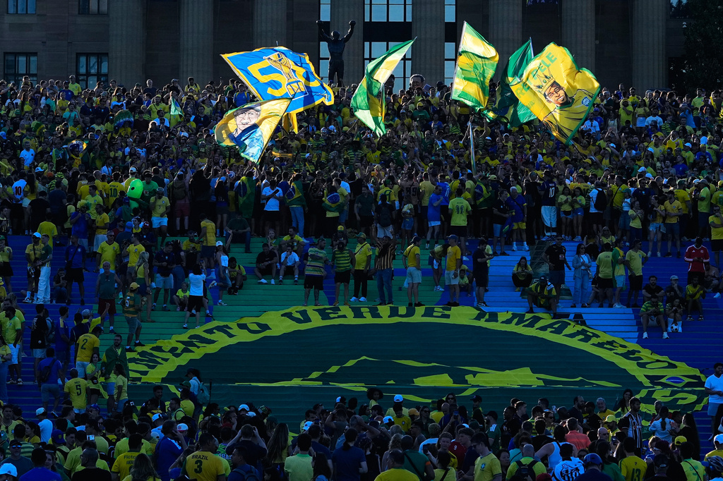 Fans of Brazil cheer as they gather at the Rocky Steps ahead of their team's World Cup group C soccer match against Haiti in Philadelphia, Thursday, June 18, 2026. (AP Photo/Petr David Josek)