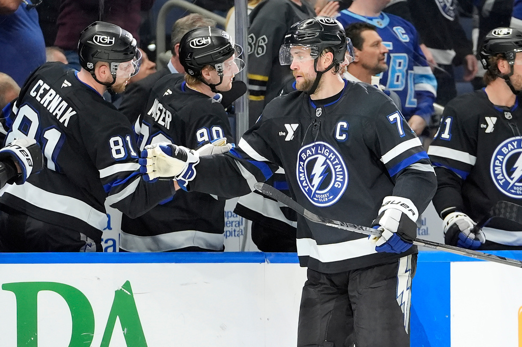 FILE - Tampa Bay Lightning defenseman Victor Hedman, front, celebrates with the bench after scoring against the Buffalo Sabres during the third period of an NHL hockey game Saturday, Feb. 28, 2026, in Tampa, Fla. (AP Photo/Chris O'Meara, File)