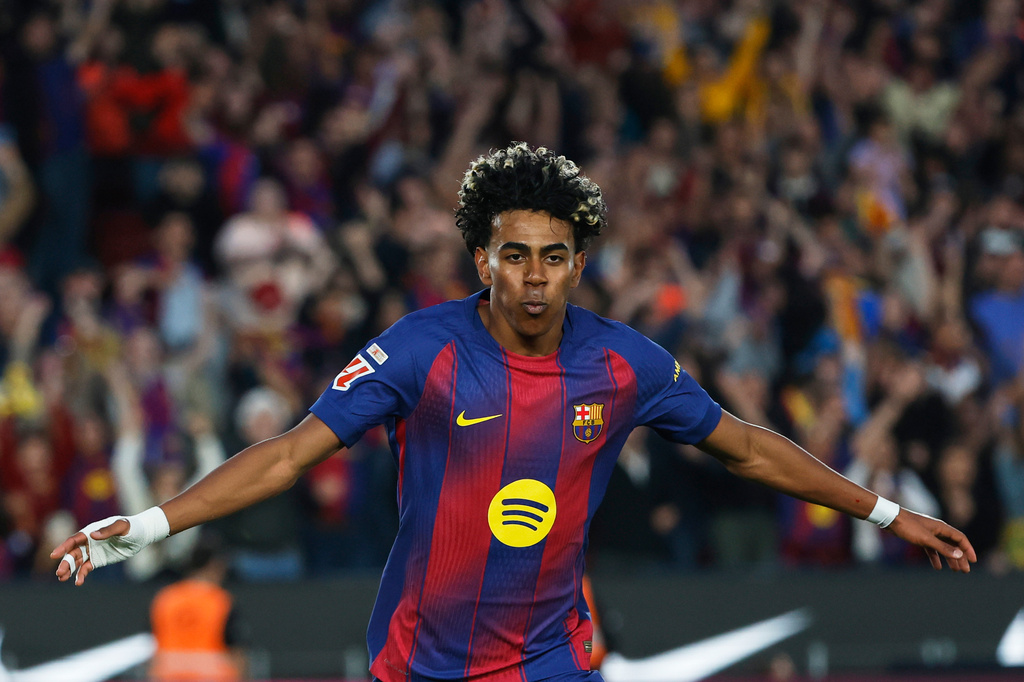 Barcelona's Lamine Yamal celebrates after scoring his side's third goal during the Spanish La Liga soccer match between Barcelona and Espanyol in Barcelona, Spain, Saturday, April 11, 2026. (AP Photo/Joan Monfort)