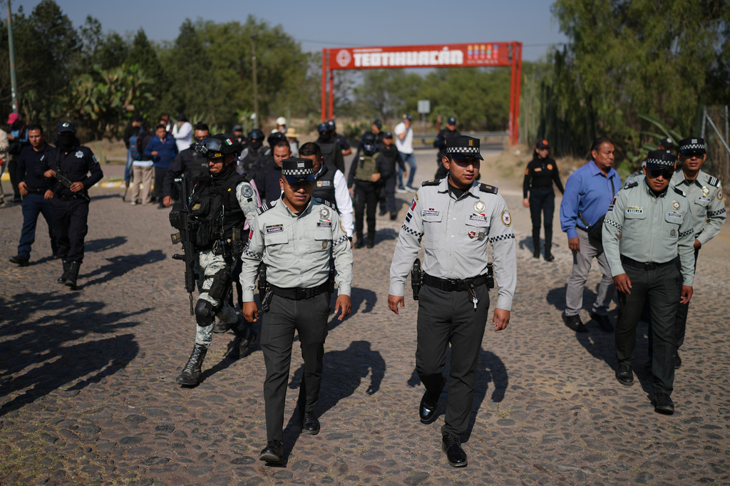 Police deploy at the Teotihuacan pyramids as the archaeological site reopens to visitors two days after a gunman opened fire on the outskirts of Mexico City, Wednesday, April 22, 2026. (AP Photo/Eduardo Verdugo)