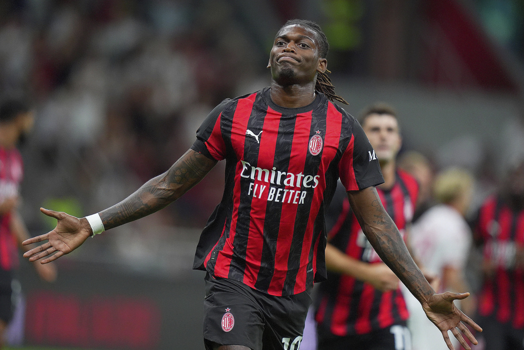 AC Milan's Rafael Leao celebrates after scoring the opening goal during the round of 64 of the Italian Cup soccer match between Milan and Bari, at San Siro Stadium in Milan, Italy, Sunday, Aug. 17, 2025. (Spada/LaPresse via AP)