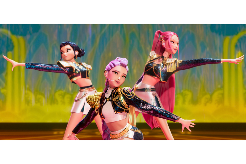 This image released by Netflix shows characters Zoey, from left, Rumi and Mira in a scene from "KPop Demon Hunters." (Netflix via AP)