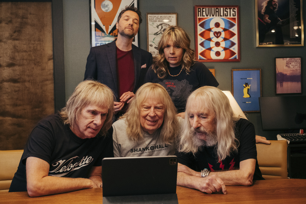 This image released by Bleecker Street shows,back row from left, Chris Addison and Kerry Godliman, front row from left, Christopher Guest, Michael McKean, and Harry Shearer in a scene from "Spinal Tap II: The End Continues." (Kyle Kaplan/Bleecker Street via AP)