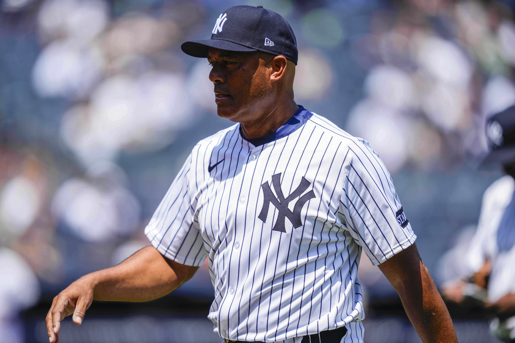 Former New York Yankees' Mariano Rivera (42) walks back to dugout during the first inning of the Yankees Old-Timers' Day Game before a baseball game against the Houston Astros, Saturday, Aug. 9, 2025, in New York. (AP Photo/Yuki Iwamura)