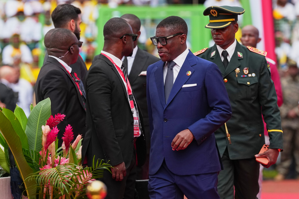 FILE - Equatorial Guinea Vice President, Teodoro Nguema Obiang Mangue, second right, arrives to attend the Holy Mass with Pope Leo XIV at the Malabo Stadium in Malabo, Equatorial Guinea, April 23, 2026. (AP Photo/Misper Apawu, File)