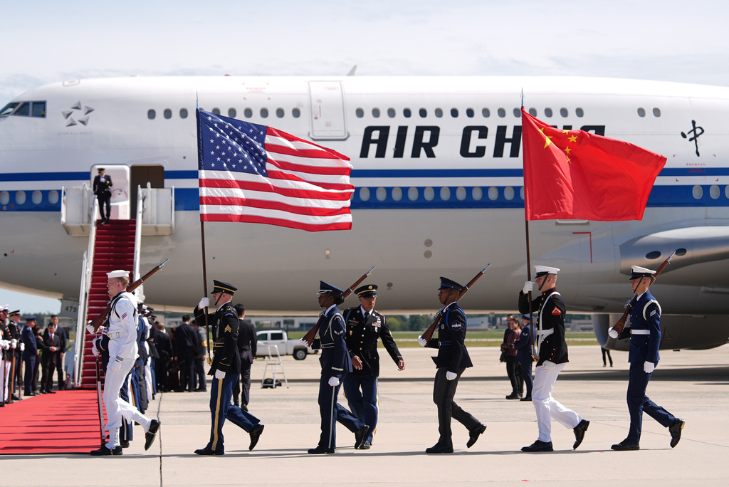 A U.S. Joint Military Honor Guard marches into position before Chinese President Xi Jinping and his wife Peng Liyuan arrive to board their aircraft at Joint Base Andrews, Md., Friday, Sept. 25, 2026. (AP Photo/Mark Schiefelbein)