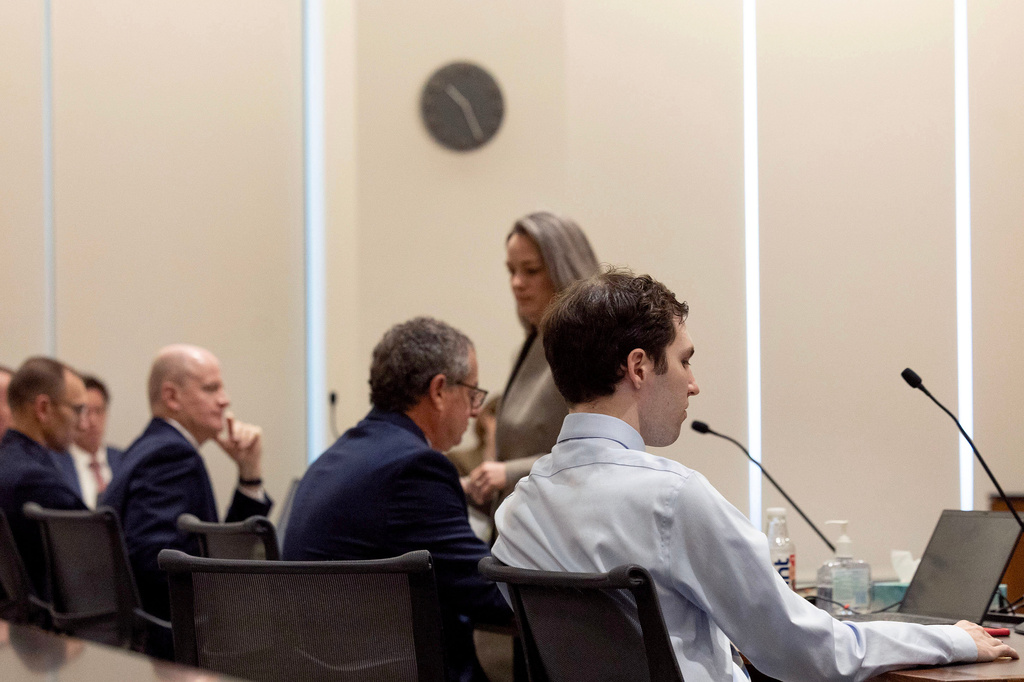 Prosecuting and defense attorneys and defendant Tyler Robinson, right, accused in the fatal shooting of conservative activist Charlie Kirk, attend a hearing in 4th District Court, Friday, March. 13, 2026, in Provo, Utah. (Laura Seitz/The Deseret News via AP, Pool)