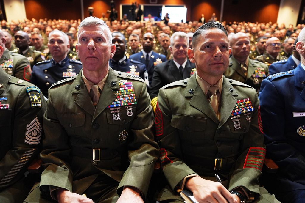 U.S. military senior leadership listen as President Donald Trump speaks at Marine Corps Base Quantico, Tuesday, Sept. 30, 2025 in Quantico, Va. (AP Photo/Evan Vucci)