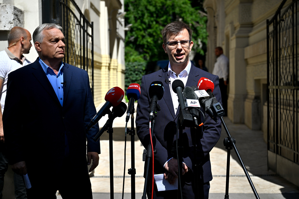 Former Hungarian Prime Minister and Chairman of the Fidesz party Viktor Orban, left, and new faction leader of the party Janos Boka hold a press conference in front of the Fidesz headquarters in Lendvay Street in Budapest, Hungary, Wednesday, July 22, 2026. (Robert Hegedus/MTI via AP)