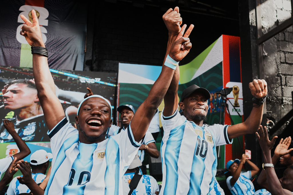 Fans react during the World Cup semifinal soccer match between England and Argentina in Port-au-Prince, Haiti, Wednesday, July 15, 2026. (AP Photo/Odelyn Joseph)