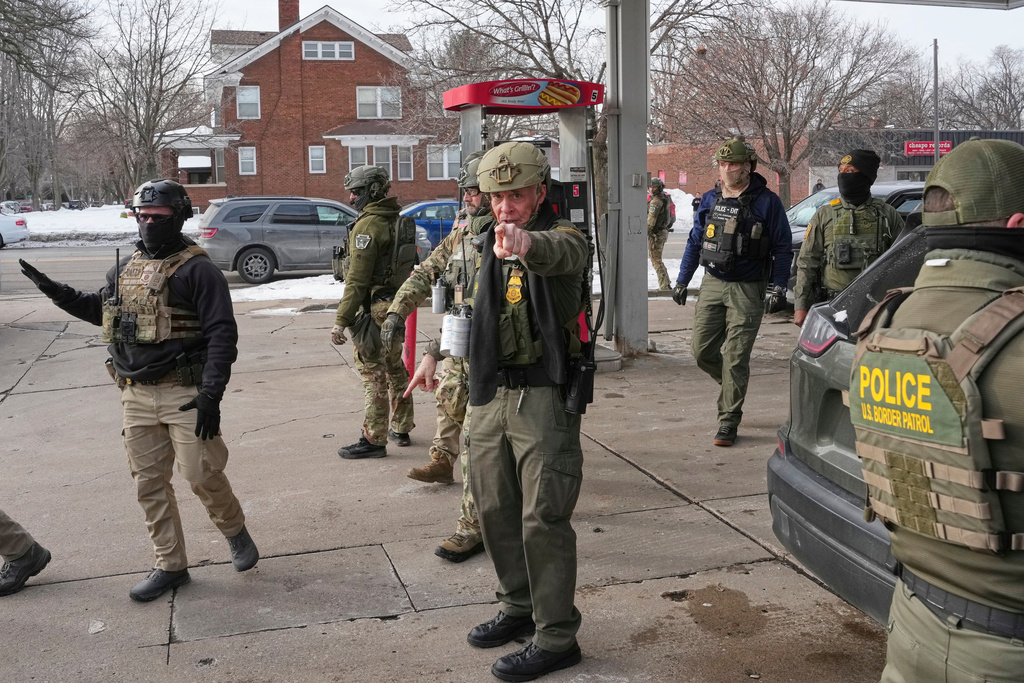FILE - U.S. Border Patrol Cmdr. Gregory Bovino warns members of the media to keep back, Jan. 11, 2026, in St. Paul, Minn. (AP Photo/Adam Gray, File)
