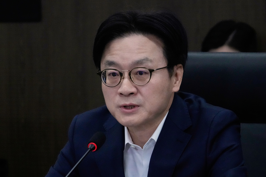 South Korean Trade Minister Kim Jung-kwan speaks during a public-private joint meeting to discuss response to U.S. tariff policies at the headquarters of the Korea Chamber of Commerce and Industry in Seoul, South Korea, Monday, Feb. 23, 2026. (AP Photo/Ahn Young-joon)