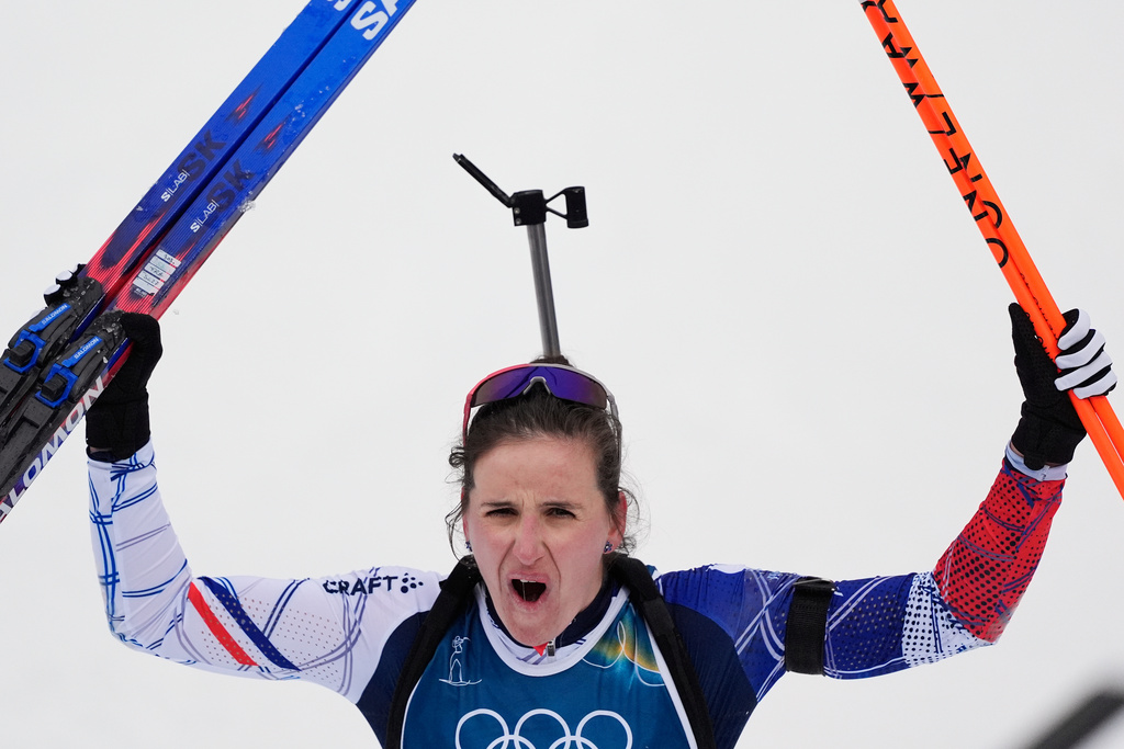 Julia Simon, of France, reacts after the women's 15-kilometer individual biathlon race at the 2026 Winter Olympics in Anterselva, Italy, Wednesday, Feb. 11, 2026. (AP Photo/Mosa'ab Elshamy)