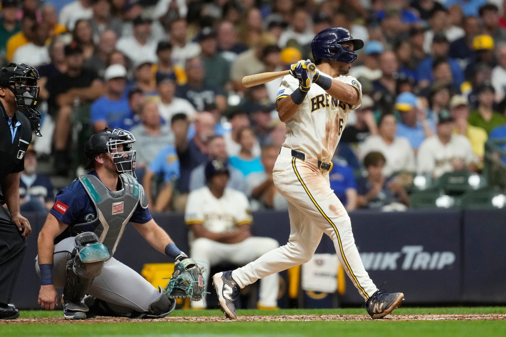 Milwaukee Brewers' David Hamilton hits a three-run home run during the sixth inning of a baseball game against the Seattle Mariners, Tuesday, Aug. 18, 2026, in Milwaukee. (AP Photo/Aaron Gash)