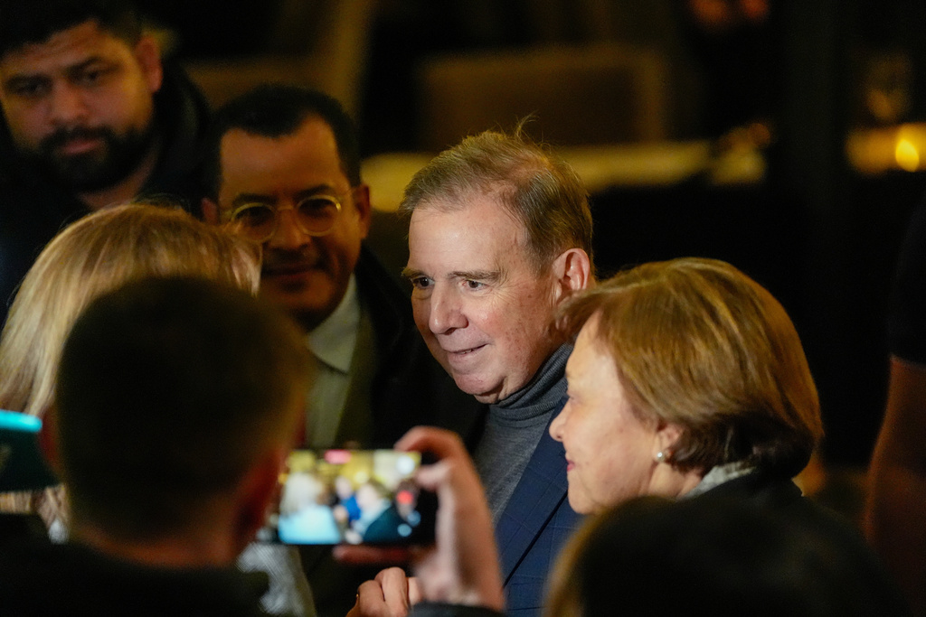 The Venezuelan opposition's presidential candidate in the 2024 presidential election, Edmondo Gonzales, center, at the Grand Hotel in Oslo, Norway, Tuesday, Dec. 9, 2025. (Lise Aserud/NTB via AP)