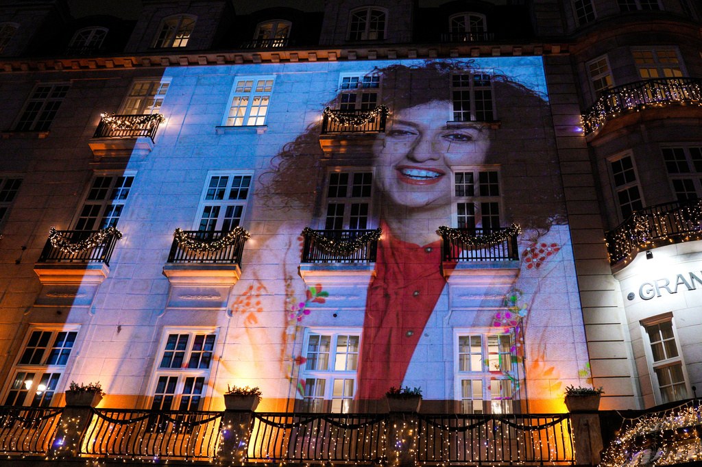 FILE - A photo of Nobel Peace Prize recipient Narges Mohammadi is projected onto the wall of the Grand Hotel in central Oslo before the Nobel banquet on Dec. 10. 2023. (Javad Parsa/NTB Scanpix via AP, File)