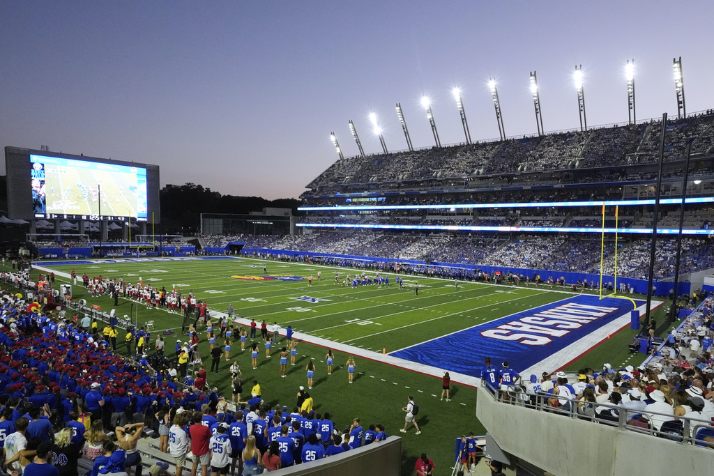 The second half of an NCAA college football game between Kansas and Fresno State is played in the new David Booth Kansas Memorial Stadium, Saturday, Aug. 23, 2025, in Lawrence, Kan. (AP Photo/Charlie Riedel)