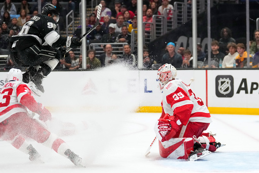 Los Angeles Kings left wing Andrei Kuzmenko, center, jumps out of the way of a shot as Detroit Red Wings goaltender Cam Talbot, right, and left wing Lucas Raymond defend during the second period of an NHL hockey game Thursday, Oct. 30, 2025, in Los Angeles. (AP Photo/Mark J. Terrill) Los Angeles Kings left wing Andrei Kuzmenko, center, jumps out of the way of a shot as Detroit Red Wings goaltender Cam Talbot, right, and left wing Lucas Raymond defend during the second period of an NHL hockey game Thursday, Oct. 30, 2025, in Los Angeles. (AP Photo/Mark J. Terrill)