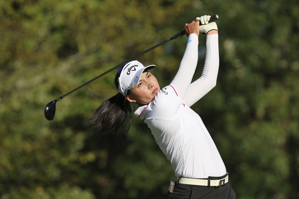 Jeeno Thitikul, of Thailand, tees off on the 17th hole during the final round of the FM Championship LPGA golf tournament at TPC Boston, Sunday, Aug. 31, 2025, in Norton, Mass. (AP Photo/Michael Dwyer)