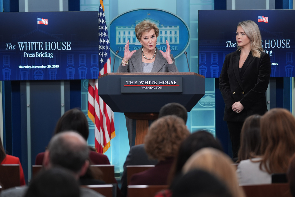 Education Secretary Linda McMahon speaks as White House press secretary Karoline Leavitt listens during a press briefing at the White House, Thursday, Nov. 20, 2025, in Washington. (AP Photo/Evan Vucci)
