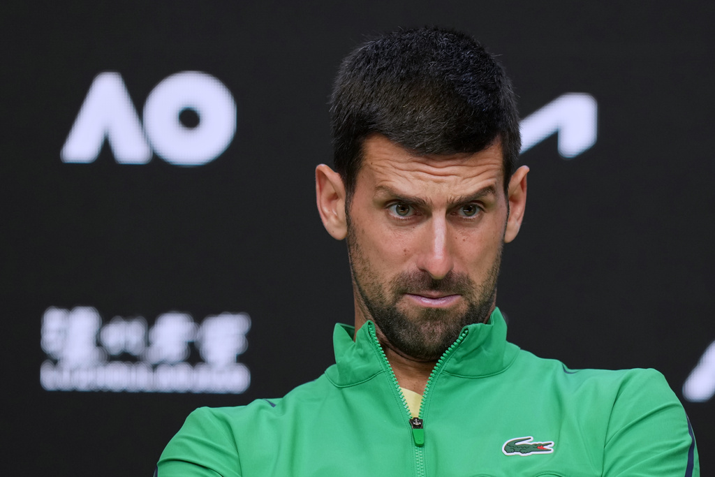 Novak Djokovic of Serbia reacts during a press conference following his loss to Carlos Alcaraz of Spain in the men's singles final at the Australian Open tennis championship in Melbourne, Australia, Sunday, Feb. 1, 2026. (AP Photo/Dar Yasin)