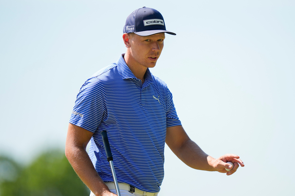 Matti Schmid, of Germany, waves on the third green during the final round of the PGA Championship golf tournament at Aronimink Golf Club, Sunday, May 17, 2026, in Newtown Square, PA. (AP Photo/Frank Franklin II)