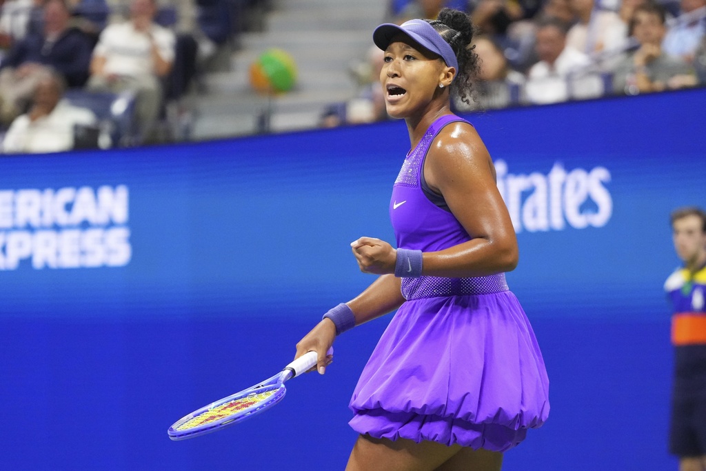 Naomi Osaka, of Japan, reacts against Amanda Anisimova, of the United States, during the women's singles semifinals of the U.S. Open tennis championships, Thursday, Sept. 4, 2025, in New York. (AP Photo/Kirsty Wigglesworth)