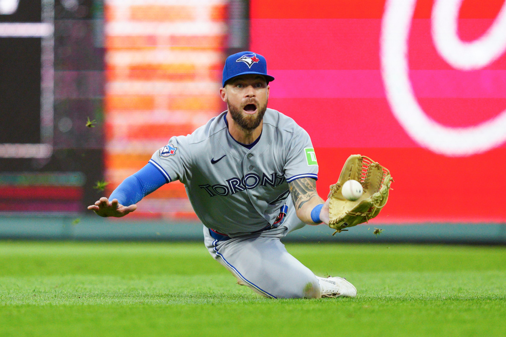 Toronto Blue Jays' Nathan Lukes makes a catch on a ball hit by Philadelphia Phillies' Garrett Stubbs during the fifth inning of a baseball game, Saturday, Aug. 8, 2026, in Philadelphia. (AP Photo/Derik Hamilton)