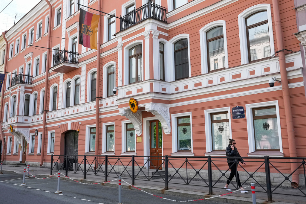 FILE - A woman walks past the German Consulate General building in St. Petersburg, Russia, June 1, 2023. (AP Photo/Dmitri Lovetsky, File)