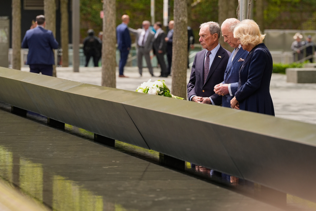 Former New York City mayor Michael Bloomberg, from left, Britain's King Charles III and Queen Camilla visit the 9/11 Memorial, Wednesday, April 29, 2026, in New York. (AP Photo/Seth Wenig)