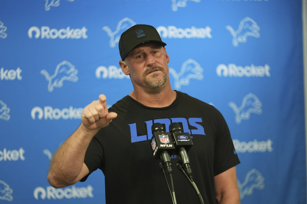Detroit Lions coach Dan Campbell answers a question during a news conference after a preseason NFL football game against the Houston Texans Saturday, Aug. 23, 2025, in Detroit. (AP Photo/Paul Sancya)