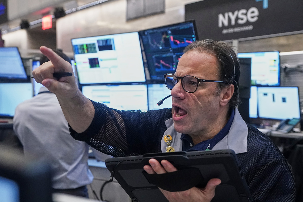Options trader Anthony Spina works on the floor of the New York Stock Exchange, Friday, Nov. 14, 2025. (AP Photo/Richard Drew)