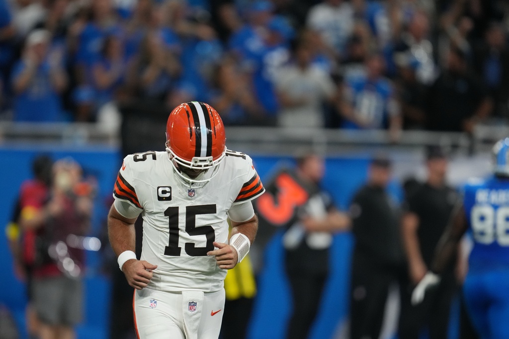 Cleveland Browns quarterback Joe Flacco (15) runs off the field after throwing an interception during the first half of an NFL football game against the Detroit Lions, Sunday, Sept. 28, 2025, in Detroit. (AP Photo/Paul Sancya)